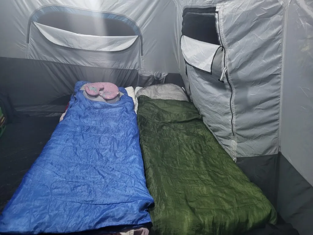 Sleeping bags on a cot: Most important items you need for camping
